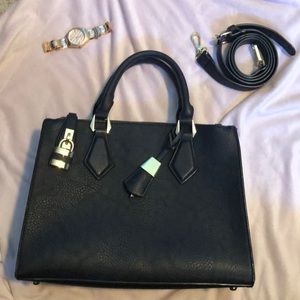 Black purse with gold hardware